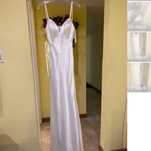 I’m selling an ivory satin dress.